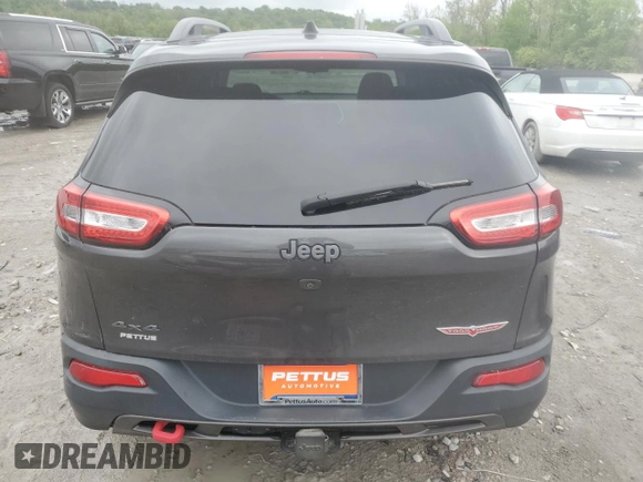 2017 Jeep Cherokee Trailhawk z VIN 1C4PJMBS5HW595681, wystawiony jako Copart lot #55242795 z przebiegiem 52 783 mil mil oraz Szkoda całkowita • Salvage title. Historia ofert i sprzedaży dostępna na DreamBid. Obrazek 6.