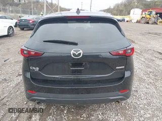 2023 Mazda CX-5 S Carbon Edition z VIN JM3KFBCM9P0130796, wystawiony jako IAAI lot #41956104 z przebiegiem 21 796 mil mil oraz . Historia ofert i sprzedaży dostępna na DreamBid. Obrazek 16.