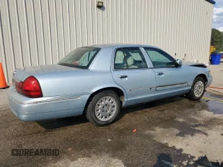 2004 Mercury Grand Marquis GS z VIN 2MEFM74W84X607050, wystawiony jako Copart lot #52303045 z przebiegiem 194 215 mil mil oraz Szkoda całkowita • Salvage title. Historia ofert i sprzedaży dostępna na DreamBid. Obrazek 3.