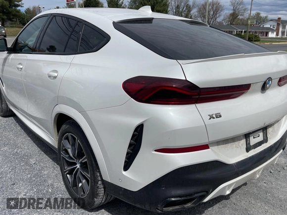 2023 BMW X6 M50i with VIN 5UXCY8C02P9N80310, listed as a Copart auction lot 50582585 with 19,686 mi miles and Clean Title. Bid and sale history available at carsss.com. Image 3.