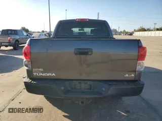 2012 Toyota Tundra 4WD Truck with VIN 5TFDW5F10CX233367, listed as a Copart auction lot 77144064 with 199,361 mi miles and Salvage Title. Bid and sale history available at carsss.com. Image 6.