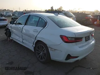 2022 BMW 3 Series 330i with VIN 3MW5R1J04N8C56510, listed as a IAAI auction lot 41458542 with 62,022 mi miles. Bid and sale history available at carsss.com. Image 3.
