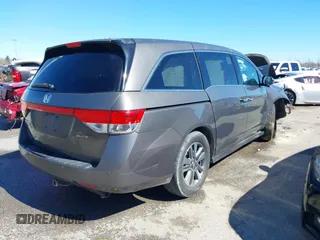 2016 Honda Odyssey Touring Elite with VIN 5FNRL5H97GB010275, listed as a IAAI auction lot 41655328 with Not Provided miles. Bid and sale history available at carsss.com. Image 4.