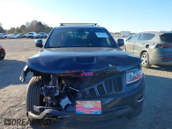 2014 Jeep Grand Cherokee Laredo with VIN 1C4RJEAG3EC218128, listed as a IAAI auction lot 40951611 with 119,596 mi miles and . Bid and sale history available at DreamBid. Image 12.