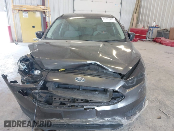 2015 Ford Focus SE with VIN 1FADP3F23FL216154, listed as a IAAI auction lot 42411857 with 127,612 mi miles and . Bid and sale history available at DreamBid. Image 6.