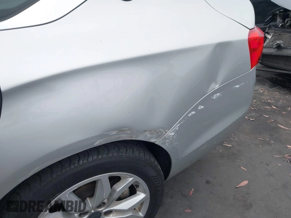 2016 Chevrolet Impala LT with VIN 2G1105SA5G9185565, listed as a IAAI auction lot 42430184 with 143,791 mi miles and . Bid and sale history available at DreamBid. Image 12.