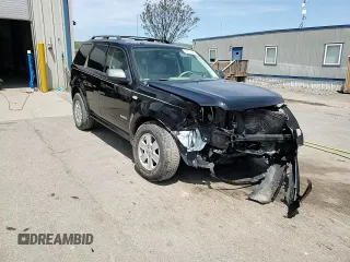 2008 Mercury Mariner z VIN 4M2CU91168KJ48614, wystawiony jako Copart lot #56472025 z przebiegiem 95 238 mil mil oraz Szkoda całkowita • Salvage title. Historia ofert i sprzedaży dostępna na DreamBid. Obrazek 14.