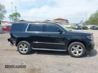 2015 Chevrolet Tahoe LT with VIN 1GNSCBKC9FR679748, listed as a IAAI auction lot 42018017 with 224,264 mi miles and . Bid and sale history available at DreamBid. Image 13.