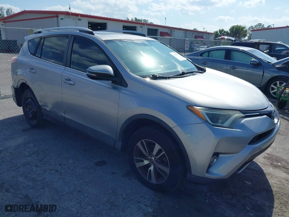 2016 Toyota RAV4 XLE with VIN 2T3WFREV7GW280362, listed as a IAAI auction lot 42023972 with 160,651 mi miles. Bid and sale history available at carsss.com. Image 1.