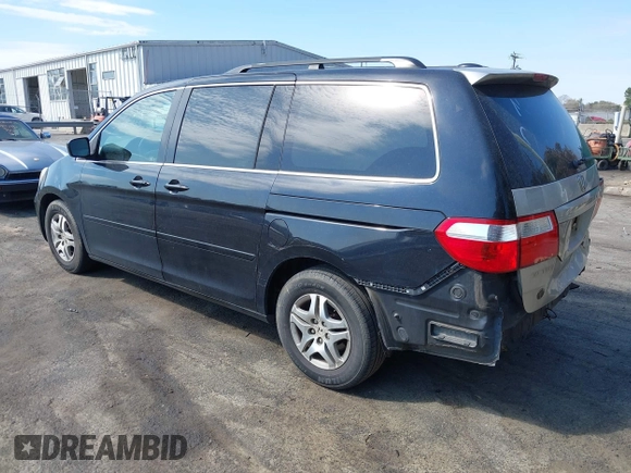 2005 Honda Odyssey EX-L with VIN 5FNRL38785B113074, listed as a IAAI auction lot 41907648 with 305,956 mi miles and . Bid and sale history available at DreamBid. Image 3.