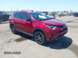 2018 Toyota RAV4 Hybrid SE with VIN JTMJJREV3JD192129, listed as a IAAI auction lot 42761943 with 203,332 mi miles and . Bid and sale history available at DreamBid. Image 1.