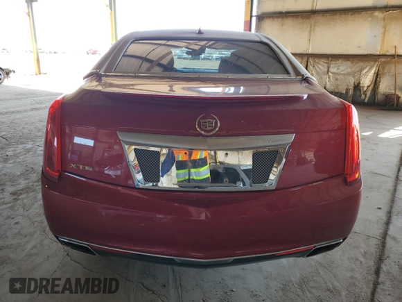 2014 Cadillac XTS Luxury z VIN 2G61M5S37E9126661, wystawiony jako Copart lot #53535315 z przebiegiem 111 469 mil mil oraz Szkody całkowita. Historia ofert i sprzedaży dostępna na DreamBid. Obrazek 6.