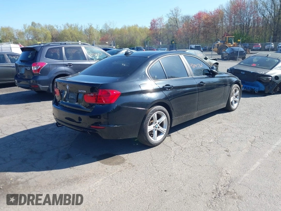 2013 BMW 3 Series 328i xDrive with VIN WBA3B5G53DNS04643, listed as a IAAI auction lot 42143365 with 107,448 mi miles. Bid and sale history available at carsss.com. Image 4.