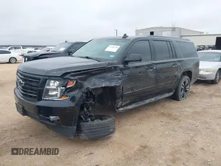 2018 Chevrolet Suburban Premier with VIN 1GNSCJKC3JR253802, listed as a IAAI auction lot 41442438 with 151,781 mi miles. Bid and sale history available at carsss.com. Image 2.