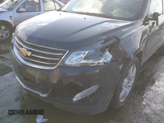 2016 Chevrolet Traverse LT with VIN 1GNKRGKD9GJ301823, listed as a IAAI auction lot 41374254 with 145,235 mi miles and . Bid and sale history available at DreamBid. Image 6.
