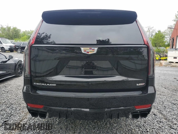 2023 Cadillac Escalade ESV AWD V-Series z VIN 1GYS4SK93PR229583, wystawiony jako Copart lot #57963475 z przebiegiem 19 649 mil mil oraz Szkody całkowita. Historia ofert i sprzedaży dostępna na DreamBid. Obrazek 6.