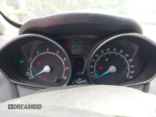 2018 Ford Fiesta SE z VIN 3FADP4BJ6JM106855, wystawiony jako IAAI lot #42491262 z przebiegiem 166 397 mil mil oraz . Historia ofert i sprzedaży dostępna na DreamBid. Obrazek 7.