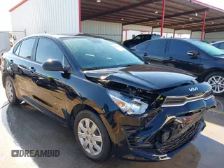 2023 Kia Rio S z VIN 3KPA24AD6PE613863, wystawiony jako IAAI lot #42223412 z przebiegiem 18 339 mil mil oraz . Historia ofert i sprzedaży dostępna na DreamBid. Obrazek 1.