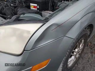 2005 Ford Focus SE with VIN 1FAHP36N65W304897, listed as a IAAI auction lot 40495173 with Not Provided miles and . Bid and sale history available at carsss.com. Image 6.