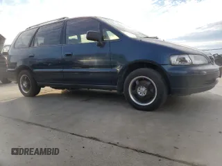 1995 Honda Odyssey z VIN JHMRA1847SC002720, wystawiony jako Copart lot #37806184 z przebiegiem 138 160 mil mil oraz Nie do naprawy • Non repairable. Historia ofert i sprzedaży dostępna na DreamBid. Obrazek 4.