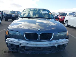 2002 BMW 3 Series 325i with VIN WBAET37482NG74460, listed as a IAAI auction lot 41712972 with 176,762 mi miles. Bid and sale history available at carsss.com. Image 6.