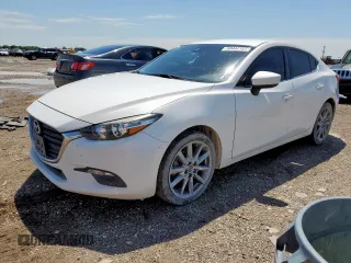 2018 Mazda 3 Touring z VIN 3MZBN1V31JM161004, wystawiony jako Copart lot #58444185 z przebiegiem 104 199 mil mil oraz Szkoda całkowita • Salvage title. Historia ofert i sprzedaży dostępna na DreamBid. Obrazek 1.