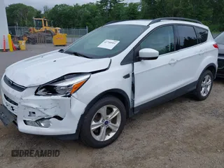 2014 Ford Escape SE with VIN 1FMCU9GX4EUE32062, listed as a IAAI auction lot 42710911 with 68,201 mi miles and . Bid and sale history available at DreamBid. Image 2.