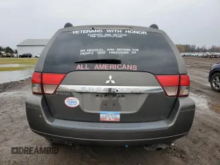 2011 Mitsubishi Endeavor LS with VIN 4A4JN2AS6BE032693, listed as a Copart auction lot 86910564 with 130,097 mi miles and Salvage Title. Bid and sale history available at carsss.com. Image 6.
