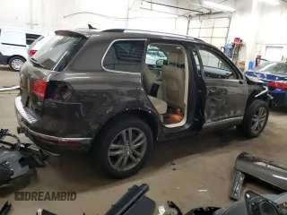 2016 Volkswagen Touareg Sport z VIN WVGEP9BPXGD006774, wystawiony jako Copart lot #56045495 z przebiegiem 85 695 mil mil oraz Szkoda całkowita • Salvage title. Historia ofert i sprzedaży dostępna na DreamBid. Obrazek 3.
