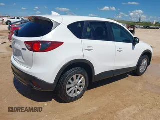 2016 Mazda CX-5 Touring z VIN JM3KE2CY0G0840918, wystawiony jako IAAI lot #42205529 z przebiegiem 74 515 mil mil oraz . Historia ofert i sprzedaży dostępna na DreamBid. Obrazek 4.