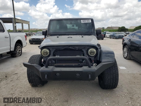 2016 Jeep Wrangler Unlimited Sahara with VIN 1C4HJWEG8GL275844, listed as a Copart auction lot 58997665 with 71,583 mi miles and Salvage title. Bid and sale history available at DreamBid. Image 5.