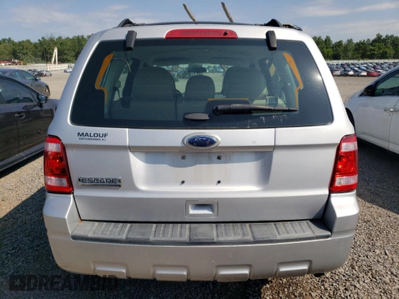 2011 Ford Escape XLS z VIN 1FMCU0C77BKB10475, wystawiony jako Copart lot #65480065 z przebiegiem 90 760 mil mil oraz Czysty tytuł • Clean title. Historia ofert i sprzedaży dostępna na DreamBid. Obrazek 6.