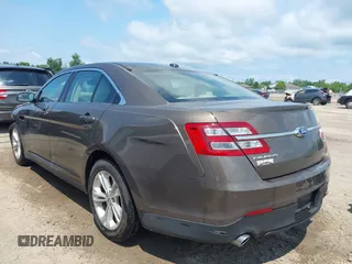 2015 Ford Taurus SEL with VIN 1FAHP2E82FG201994, listed as a IAAI auction lot 42750171 with 228,873 mi miles and . Bid and sale history available at DreamBid. Image 3.