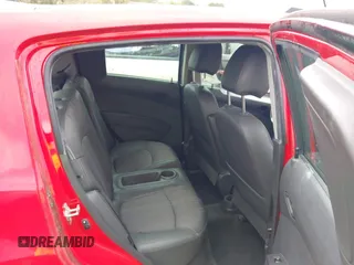 2014 Chevrolet Spark LS z VIN KL8CB6S98EC548672, wystawiony jako IAAI lot #41953786 z przebiegiem 114 330 mil mil oraz . Historia ofert i sprzedaży dostępna na DreamBid. Obrazek 8.