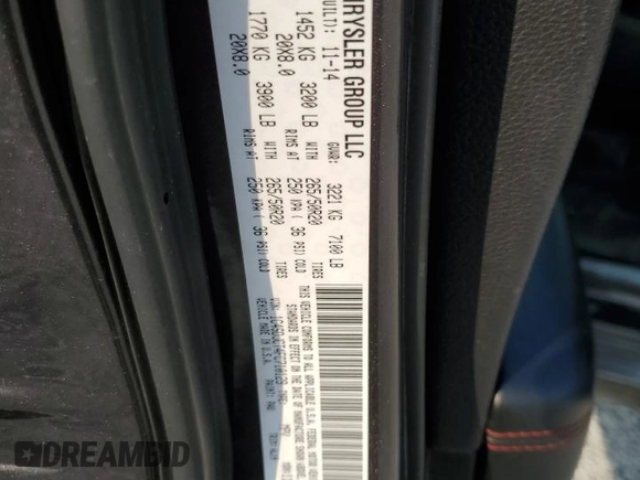 2015 Dodge Durango R/T z VIN 1C4SDJCT4FC710129, wystawiony jako Copart lot #59618075 z przebiegiem 159 577 mil mil oraz Szkoda całkowita • Salvage title. Historia ofert i sprzedaży dostępna na DreamBid. Obrazek 13.