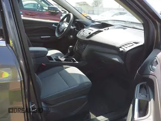 2017 Ford Escape SE z VIN 1FMCU0GD9HUD28110, wystawiony jako IAAI lot #41903505 z przebiegiem 66 808 mil mil oraz . Historia ofert i sprzedaży dostępna na DreamBid. Obrazek 5.
