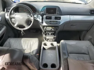 2010 Honda Odyssey EX-L with VIN 5FNRL3H72AB055070, listed as a Copart auction lot 80328974 with 221,467 mi miles and Salvage Title. Bid and sale history available at DreamBid. Image 8.