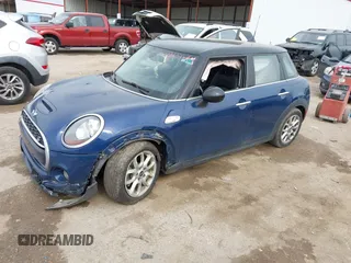 2017 MINI Hardtop 4 Door Cooper S z VIN WMWXU3C3XH2F49313, wystawiony jako IAAI lot #42137594 z przebiegiem 87 865 mil mil oraz . Historia ofert i sprzedaży dostępna na DreamBid. Obrazek 16.