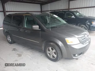 2010 Dodge Grand Caravan SXT z VIN 2D4RN5D11AR220105, wystawiony jako IAAI lot #42299610 z przebiegiem 223 842 mil mil oraz . Historia ofert i sprzedaży dostępna na DreamBid. Obrazek 1.