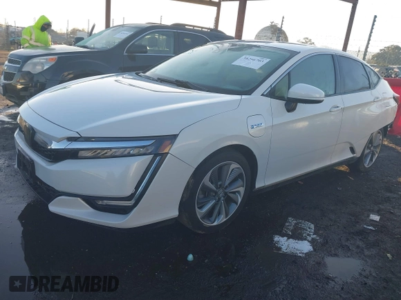 2018 Honda Clarity z VIN JHMZC5F11JC013866, wystawiony jako IAAI lot #38266703 z przebiegiem 97 522 mil mil oraz . Historia ofert i sprzedaży dostępna na DreamBid. Obrazek 18.