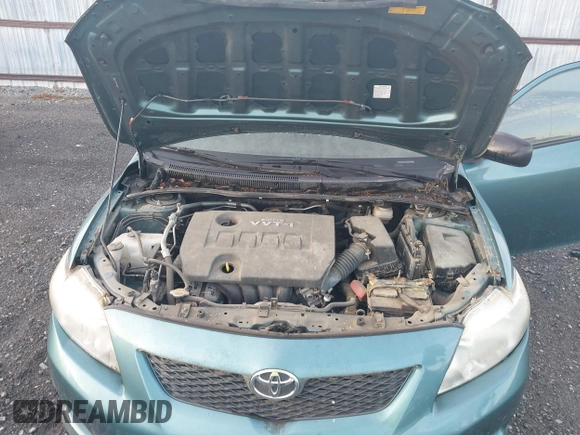 2009 Toyota Corolla with VIN JTDBL40E099063708, listed as a IAAI auction lot 42085584 with 110,075 mi miles. Bid and sale history available at carsss.com. Image 10.