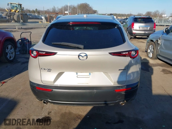 2024 Mazda CX-30 S Premium with VIN 3MVDMBDM9RM628162, listed as a IAAI auction lot 41262359 with 30,392 mi miles and . Bid and sale history available at DreamBid. Image 16.