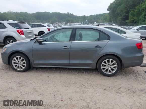 2014 Volkswagen Jetta SE with VIN 3VWD07AJ2EM209176, listed as a IAAI auction lot 42460383 with 172,550 mi miles and . Bid and sale history available at DreamBid. Image 14.