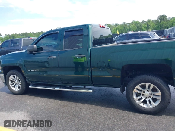 2014 Chevrolet Silverado 1500 LT with VIN 1GCRCREH2EZ323115, listed as a IAAI auction lot 42055949 with 61,337 mi miles and . Bid and sale history available at DreamBid. Image 14.