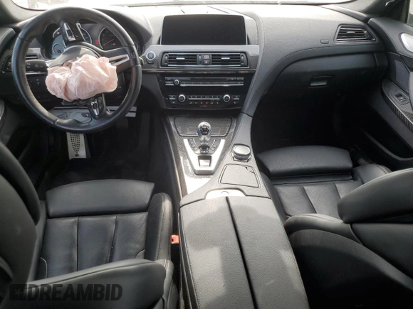 2016 BMW M6 z VIN WBS6E9C53GGF92689, wystawiony jako Copart lot #60226324 z przebiegiem Nie podano mil oraz Szkody całkowita. Historia ofert i sprzedaży dostępna na DreamBid. Obrazek 8.