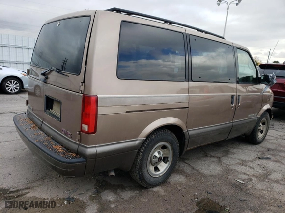 1999 GMC Safari Passenger with VIN 1GKEL19W4XB506220, listed as a Copart auction lot 77257424 with 151,966 mi miles and Clean Title. Bid and sale history available at carsss.com. Image 3.