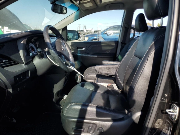 2015 Toyota Sienna SE with VIN 5TDXK3DC7FS549635, listed as a Copart auction lot 74843324 with 78,403 mi miles and Salvage Title. Bid and sale history available at carsss.com. Image 7.