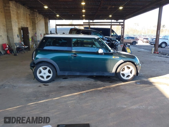 2002 MINI Hardtop with VIN WMWRC33472TC34913, listed as a IAAI auction lot 41599382 with 150,177 mi miles and . Bid and sale history available at DreamBid. Image 13.