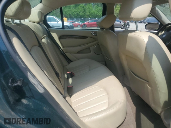 2004 Jaguar X-Type with VIN SAJEA51C64WE17722, listed as a Copart auction lot 55416405 with 89,047 mi miles and Salvage Title. Bid and sale history available at DreamBid. Image 10.