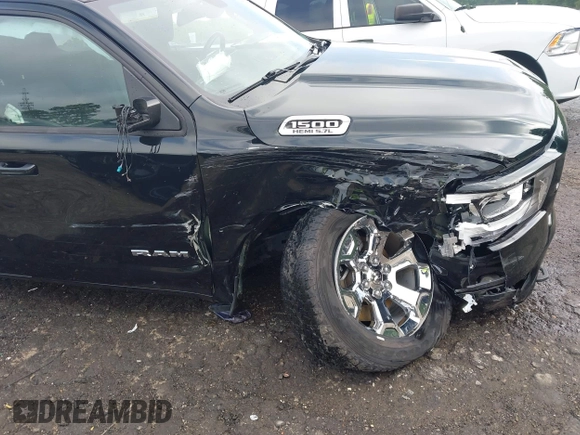 2019 Ram 1500 Big Horn z VIN 1C6SRFFT3KN858854, wystawiony jako IAAI lot #42274337 z przebiegiem 91 689 mil mil oraz . Historia ofert i sprzedaży dostępna na DreamBid. Obrazek 6.
